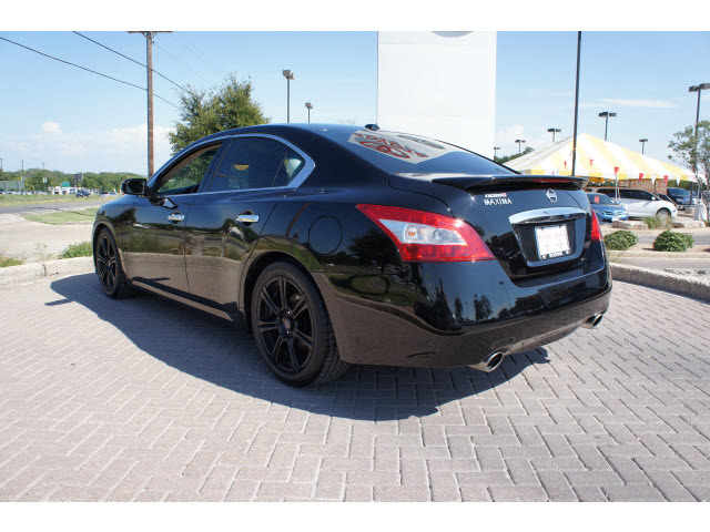 2011 Nissan maxima black rims